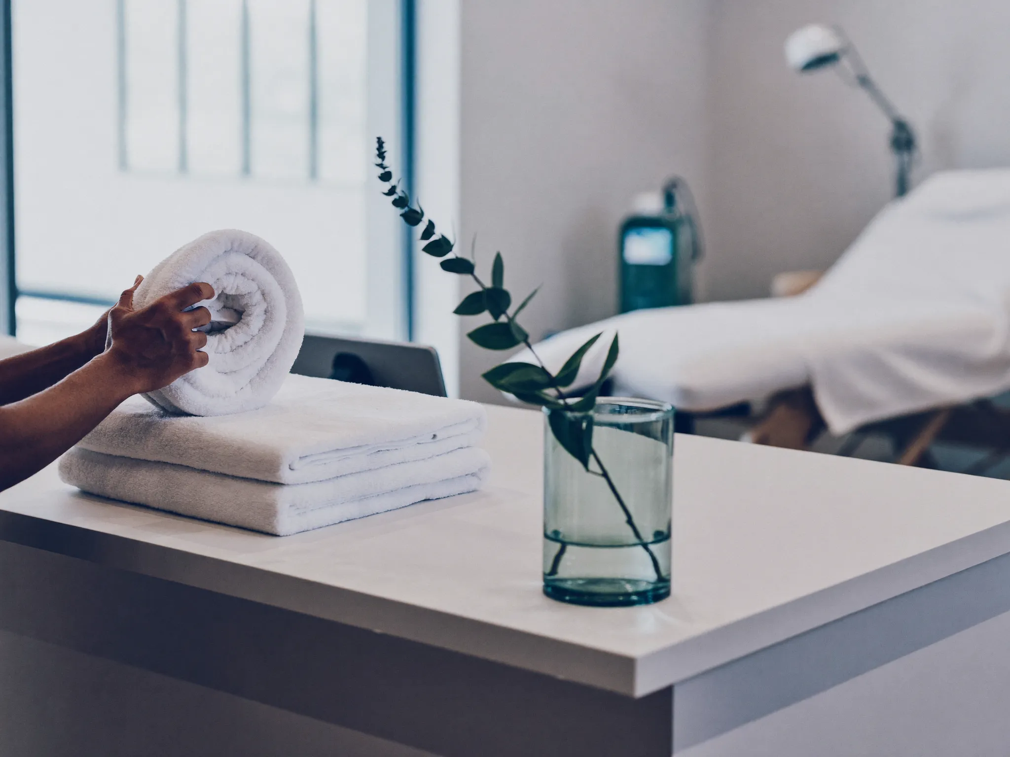 A bright, calm med spa treatment room ready for the next appointment